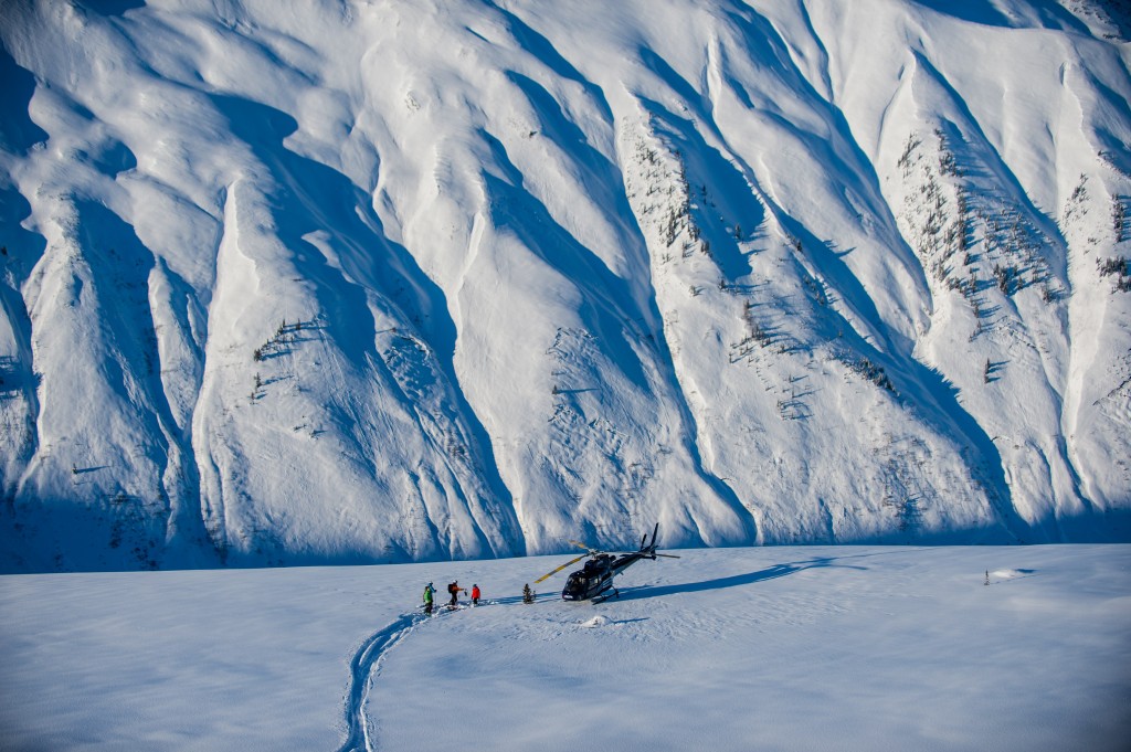 Small Group Heliskiing....the Only Way To Go.  Photo - Reuben Krabbe