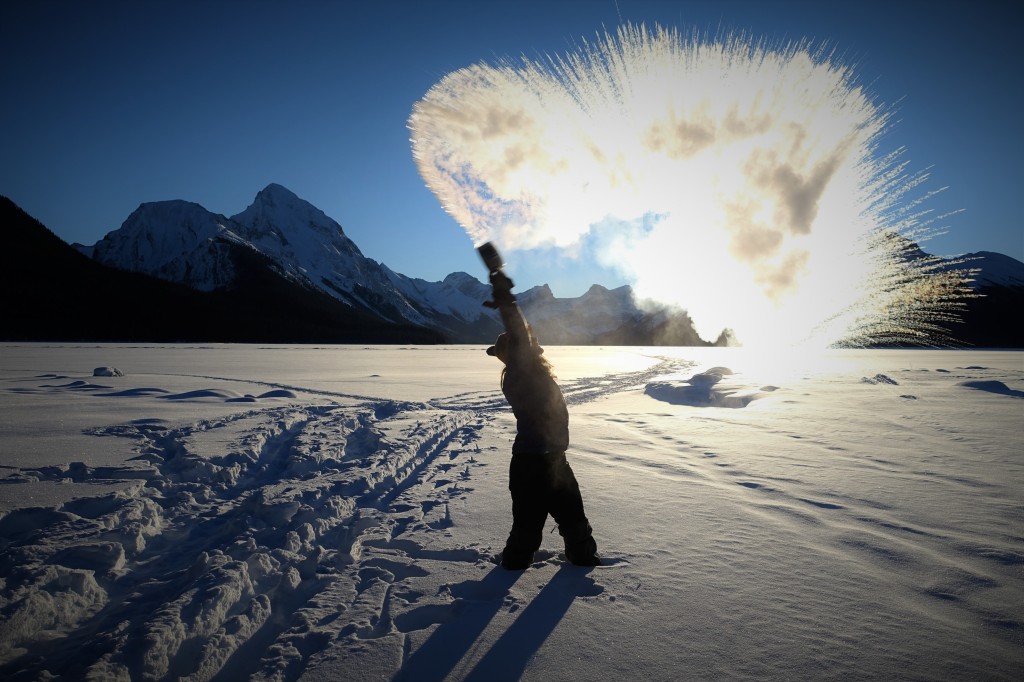 When Its Below -30 There’s Little Else To Do At Maligne Lake In The Canadian Rockies Then Boil Pots Of Water And Toss Them Into The Air To Make Snow | Liam Harrap